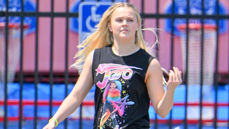 Jojo Siwa has a new car with her face on it! This time it's a Lamborghini Urus. Jojo was out and full on repping her self brand today as she not only wore a teeshirt with herself on it, but drove her car with THREE huge pictures of herself on the side of the door. 01 May 2023 Pictured: Jojo Siwa. Photo credit: Snorlax / MEGA TheMegaAgency.com +1 888 505 6342 (Mega Agency TagID: MEGA975564_001.jpg) [Photo via Mega Agency]